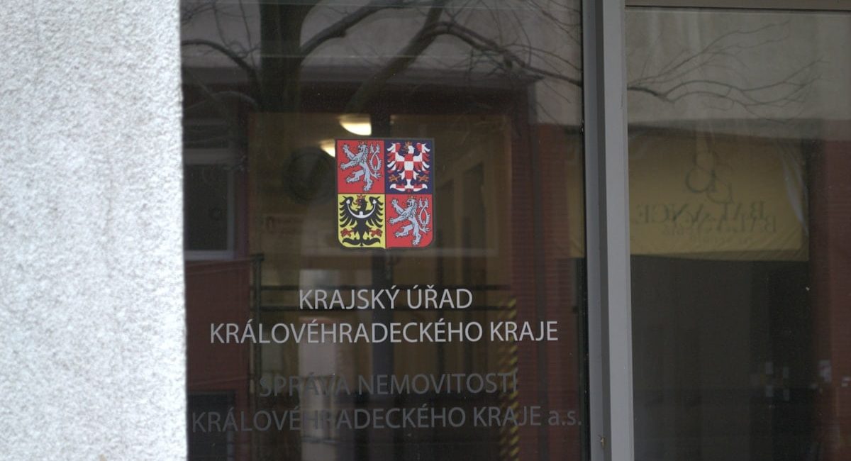 Sign on glass door for regional office.